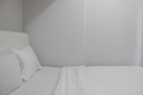 Bright and Comfy 2BR The Jarrdin Cihampelas Apartment By Travelio